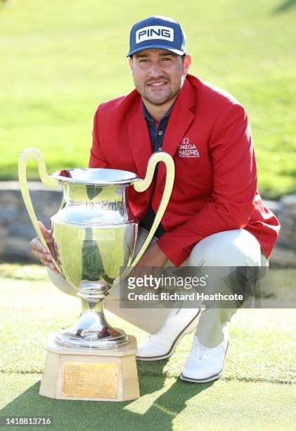 Thriston Lawrence of South Africa poses with the trophy after the prize giving on Day Four of the Omega European Masters at Crans-sur-Sierre Golf...