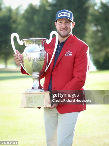 Thriston Lawrence of South Africa poses with the trophy after the prize giving on Day Four of the Omega European Masters at Crans-sur-Sierre Golf...