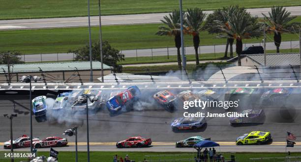 Chris Buescher, driver of the Fifth Third Bank Ford, Daniel Suarez, driver of the Freeway Insurance Chevrolet, Denny Hamlin, driver of the FedEx...