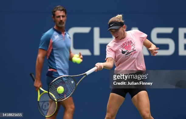 Simona Halep of Romania in a practice session with coach Patrick Mouratoglou during previews for the 2022 US Open tennis at USTA Billie Jean King...