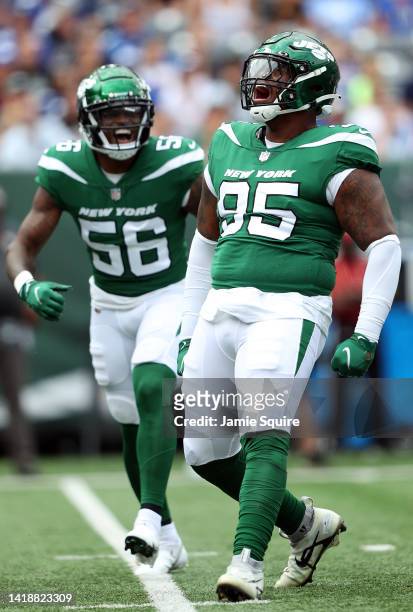 Defensive lineman Quinnen Williams celebrates with linebacker Quincy Williams after a sack during the 1st half of the preseason game against the New...