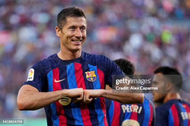 Robert Lewandowski of Barcelona celebrates after scoring their side's first goal during the LaLiga Santander match between FC Barcelona and Real...