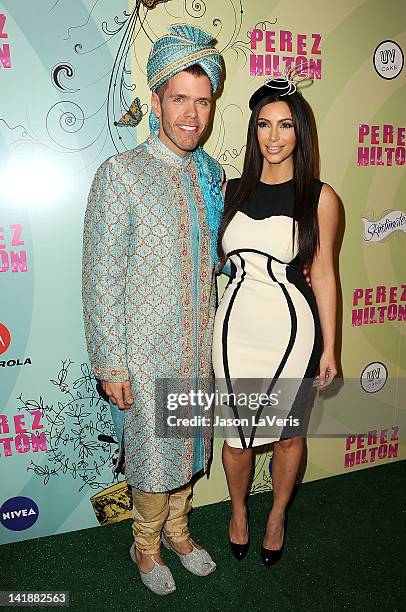 Perez Hilton and Kim Kardashian attend Perez Hilton's Mad Hatter tea party birthday celebration on March 24, 2012 in Los Angeles, California.