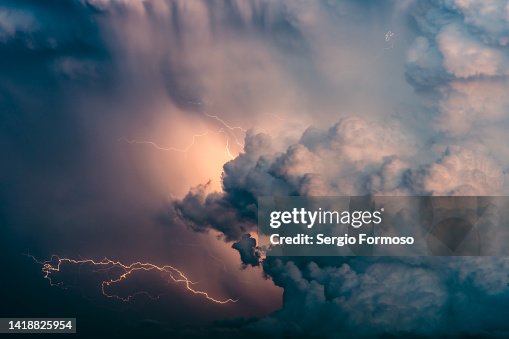 Huge thunderstorm cloud with lightning activity Huge thunderstorm cloud with lightning activity