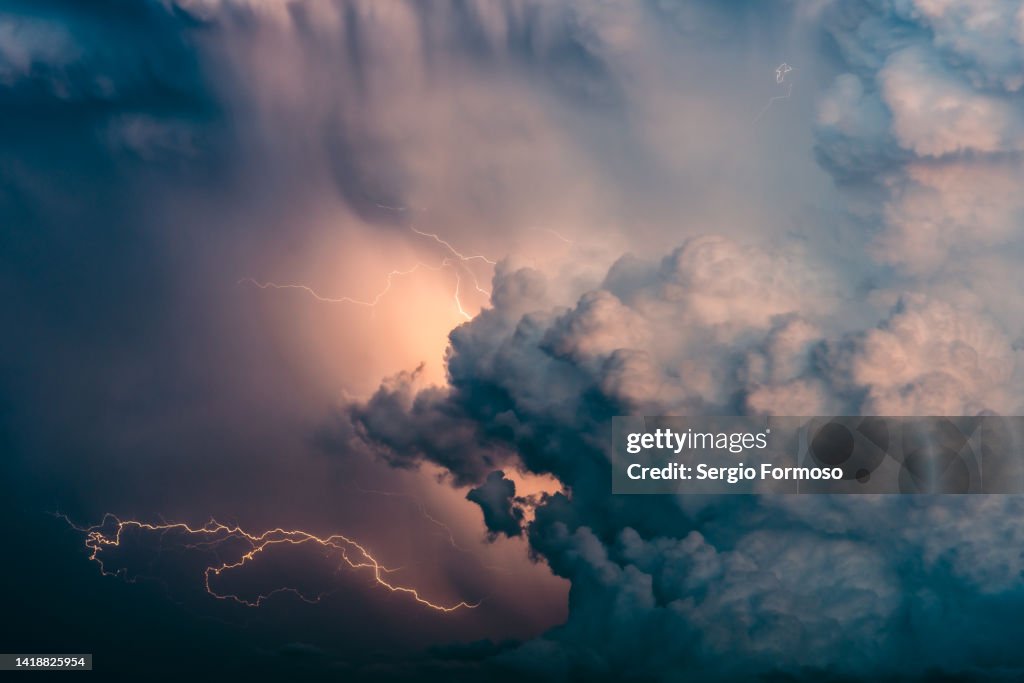 Huge thunderstorm cloud with lightning activity
