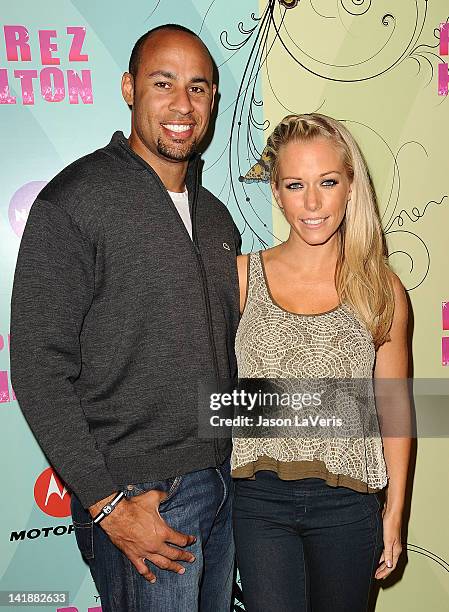 Hank Baskett and Kendra Wilkinson attend Perez Hilton's Mad Hatter tea party birthday celebration on March 24, 2012 in Los Angeles, California.