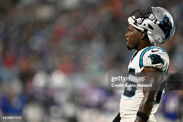 Xavier Woods of the Carolina Panthers stands on the field between plays in the second quarter against the Buffalo Bills during a preseason game at...