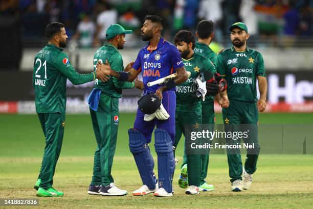 Hardik Pandya of India shake hands with Mohammad Nawaz of Pakistan after dthe DP World Asia Cup T20 match between Pakistan and India at Dubai...