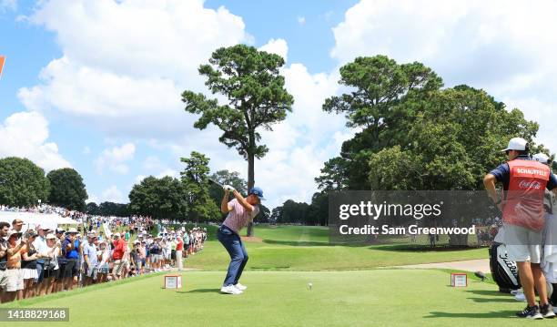 Xander Schauffele of the United States plays his shot from the fourth tee during the final round of the TOUR Championship at East Lake Golf Club on...