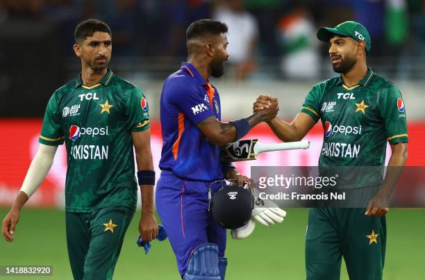 Hardik Pandya of India shake hands with Haris Rauf of Pakistan after the DP World Asia Cup T20 match between Pakistan and India at Dubai...