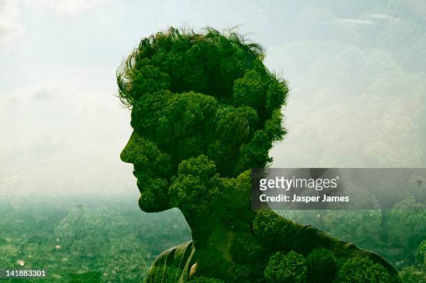 double exposure of man and trees - colore verde foto e immagini stock