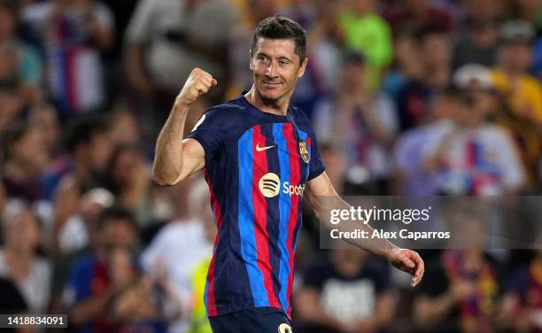 Robert Lewandowski of Barcelona celebrates after scoring their side's third goal during the LaLiga Santander match between FC Barcelona and Real...