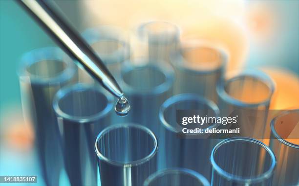 close up of examining of test sample - screening of netflixs what happened to monday arrivals stockfoto's en -beelden