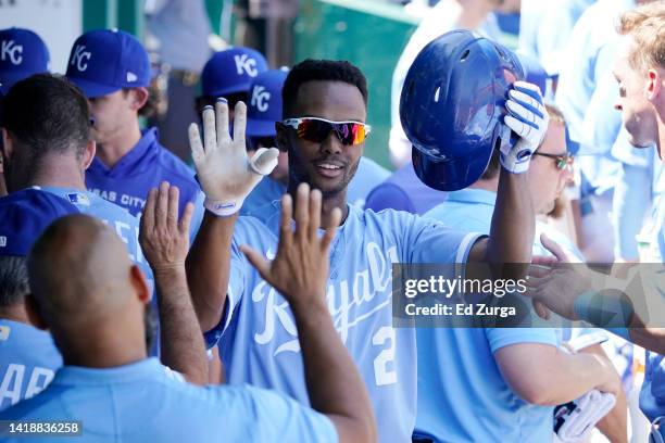 Michael A. Taylor of the Kansas City Royals celebrates his home run with teammates in the dugout in the first inning against the San Diego Padres at...