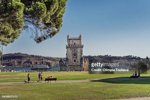 belem tower (torre de belém) in lisbon, portugal. one of the most remarkable monuments in lisbon and portugal, a landmark of portuguese identity and a symbol of a country facing the sea and its discoveries. - lisbon architecture stock pictures, royalty-free photos & images