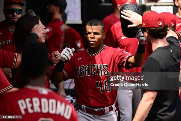 Stone Garrett of the Arizona Diamondbacks celebrates his solo home run in the second inning against the Chicago White Sox at Guaranteed Rate Field on...