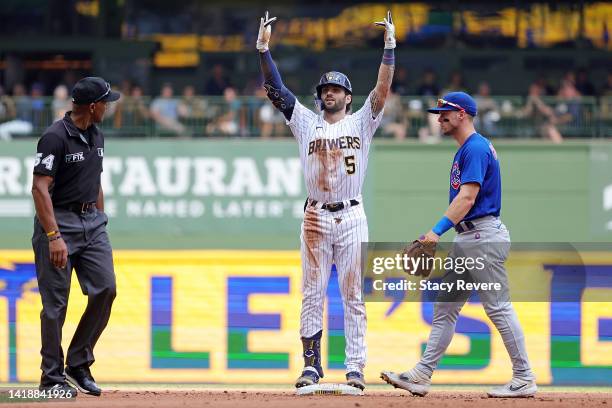 Garrett Mitchel of the Milwaukee Brewers gets a base hit against the Chicago Cubs during the fourth inning at American Family Field on August 28,...