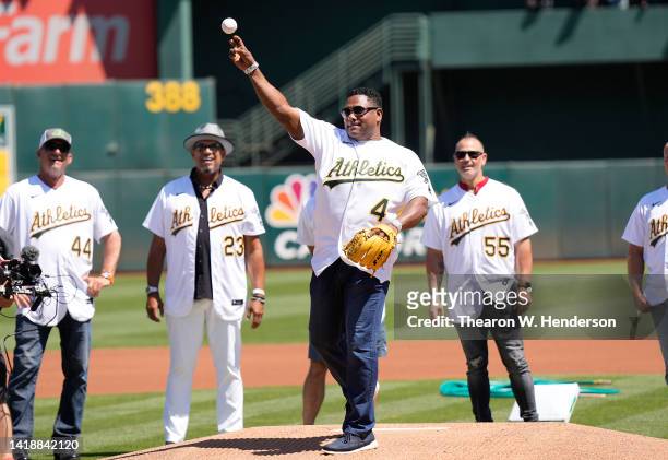 Former Major Leaguer and member of the Oakland Athletics Miguel Tejada throws out the ceremonial first pitch prior to the start of the game against...