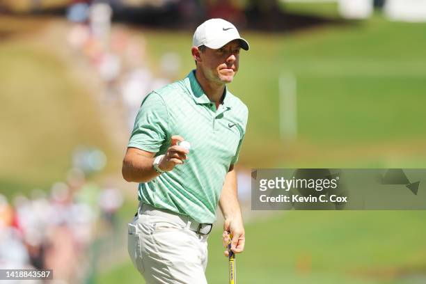 Rory McIlroy of Northern Ireland reacts on the ninth green during the final round of the TOUR Championship at East Lake Golf Club on August 28, 2022...