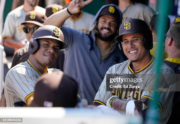 Juan Soto and Manny Machado of the San Diego Padres strike a pose as they celebrate Machado's two-run home run in the fifth inning against the Kansas...