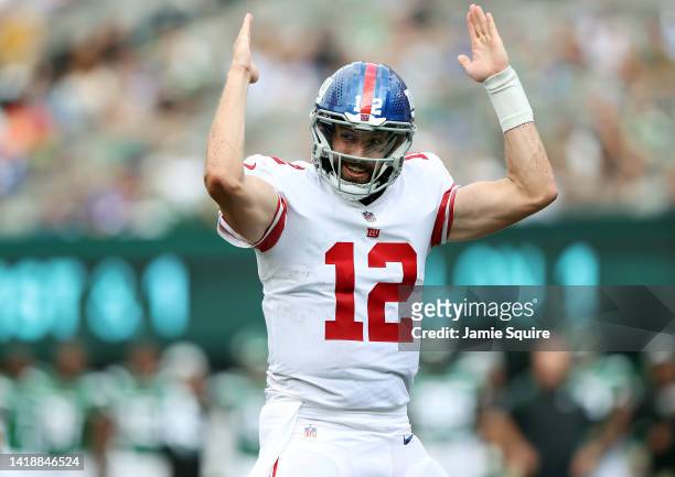 Quarterback Davis Webb of the New York Giants celebrates after a touchdown during the preseason game against the New York Jets at MetLife Stadium on...