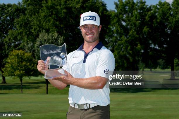 David Lingmerth of Sweden poses with the trophy after winning the Nationwide Children's Hospital Championship at OSU GC - Scarlet Course on August...