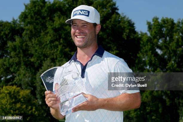 David Lingmerth of Sweden poses with the trophy after winning the Nationwide Children's Hospital Championship at OSU GC - Scarlet Course on August...