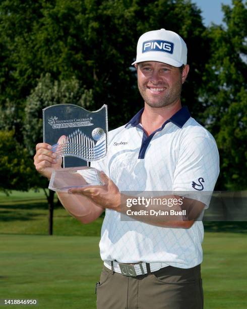 David Lingmerth of Sweden poses with the trophy after winning the Nationwide Children's Hospital Championship at OSU GC - Scarlet Course on August...