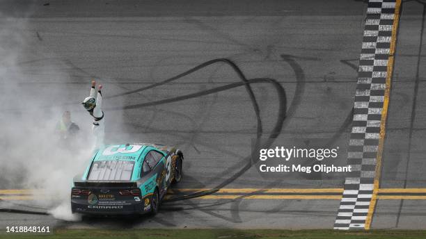 Austin Dillon, driver of the BREZTRI Chevrolet, celebrates after winning the NASCAR Cup Series Coke Zero Sugar 400 at Daytona International Speedway...