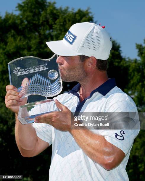 David Lingmerth of Sweden kisses the trophy after winning the Nationwide Children's Hospital Championship at OSU GC - Scarlet Course on August 28,...