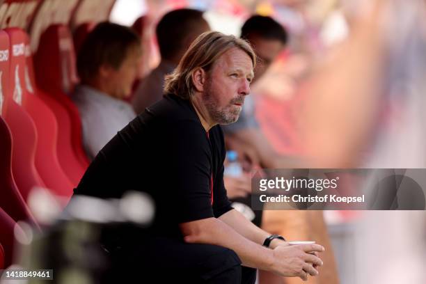 Sven Mislintat, sporting direvctor of Stuttgart sits on the bench prior to the Bundesliga match between 1. FC Köln and VfB Stuttgart at...