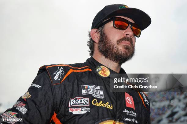 Martin Truex Jr., driver of the Bass Pro Shops Toyota, looks on after the NASCAR Cup Series Coke Zero Sugar 400 at Daytona International Speedway on...