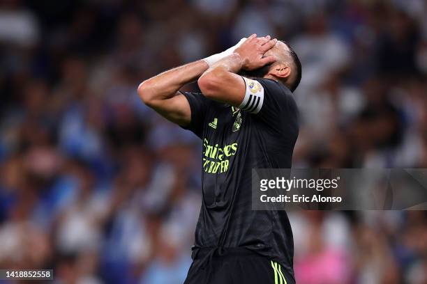 Karim Benzema of Real Madrid reacts during the LaLiga Santander match between RCD Espanyol and Real Madrid CF at Power8 Stadium on August 28, 2022 in...