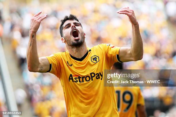 Pedro Neto of Wolverhampton Wanderers celebrates his team's first goal scored by Ruben Neves during the Premier League match between Wolverhampton...