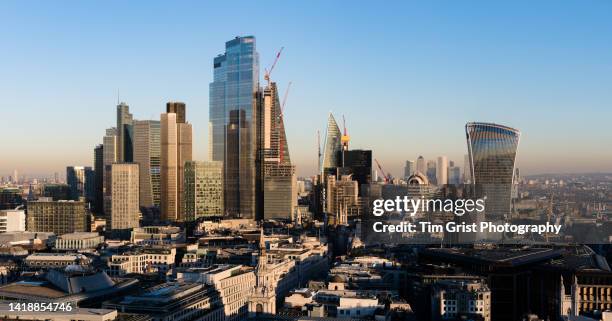 an aerial view of the city of london skyline - wealth management stock pictures, royalty-free photos & images