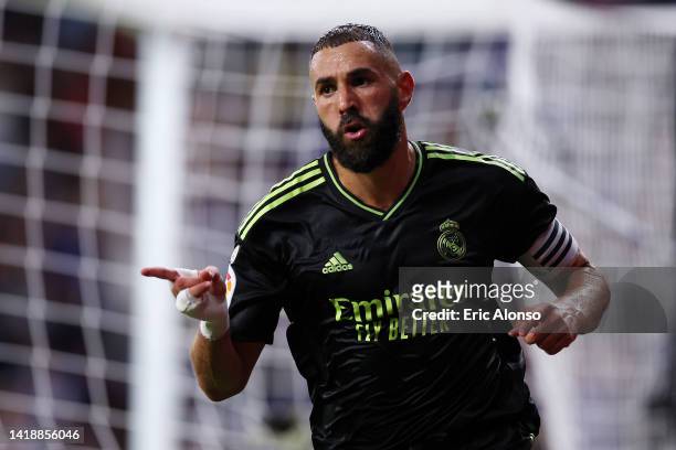 Karim Benzema of Real Madrid celebrates after scoring their side's second goal during the LaLiga Santander match between RCD Espanyol and Real Madrid...