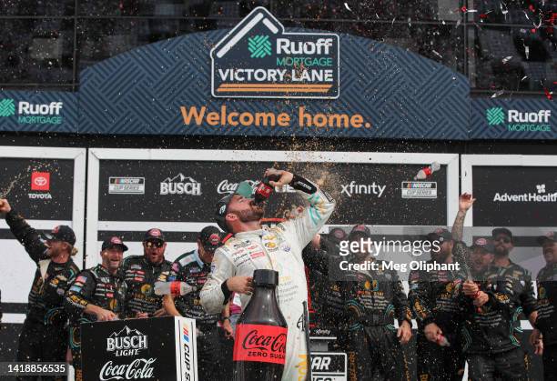 Austin Dillon, driver of the BREZTRI Chevrolet, celebrates in the Ruoff Mortgage victory lane after winning the NASCAR Cup Series Coke Zero Sugar 400...