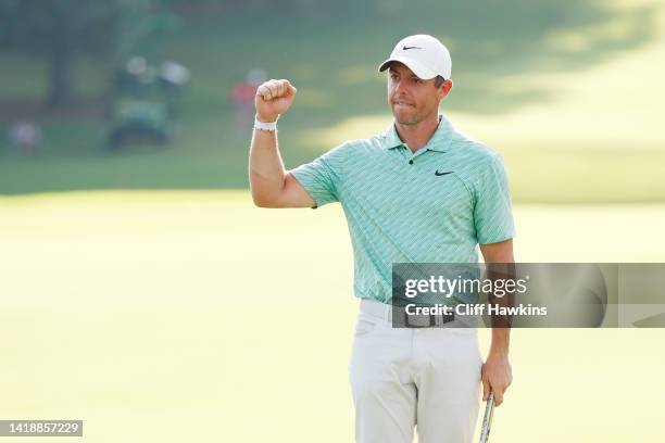 Rory McIlroy of Northern Ireland celebrates on the 18th green after winning during the final round of the TOUR Championship at East Lake Golf Club on...