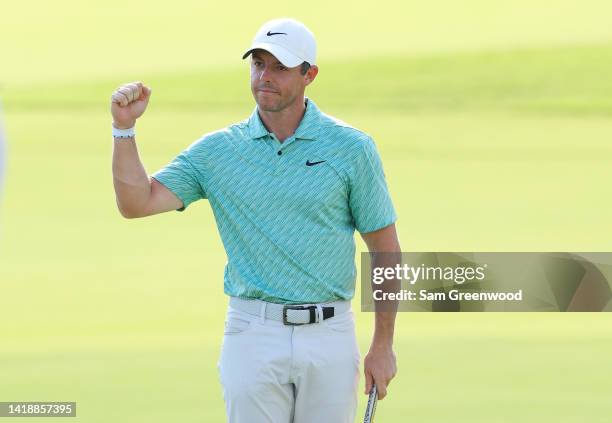 Rory McIlroy of Northern Ireland celebrates on the 18th green after winning during the final round of the TOUR Championship at East Lake Golf Club on...