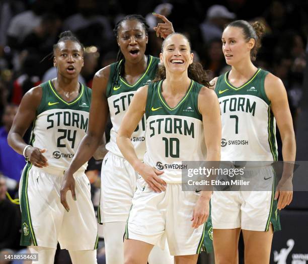 Jewell Loyd, Tina Charles, Sue Bird and Stephanie Talbot of the Seattle Storm react after time expired in the fourth quarter of Game One of the 2022...