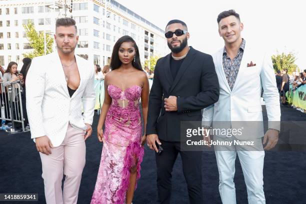 Mike Mulderrig, Trina Njoroge, Johnny Middlebrooks and Blake Horstmann attend the 2022 MTV VMAs at Prudential Center on August 28, 2022 in Newark,...