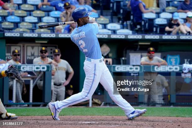 Michael A. Taylor of the Kansas City Royals hits a two-run single in the eighth inning against the San Diego Padres at Kauffman Stadium on August 28,...