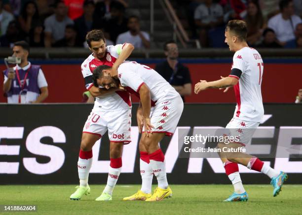 Kevin Volland of Monaco celebrates his goal with Wissam Ben Yedder , Aleksandr Golovin during the Ligue 1 Uber Eats match between Paris Saint-Germain...