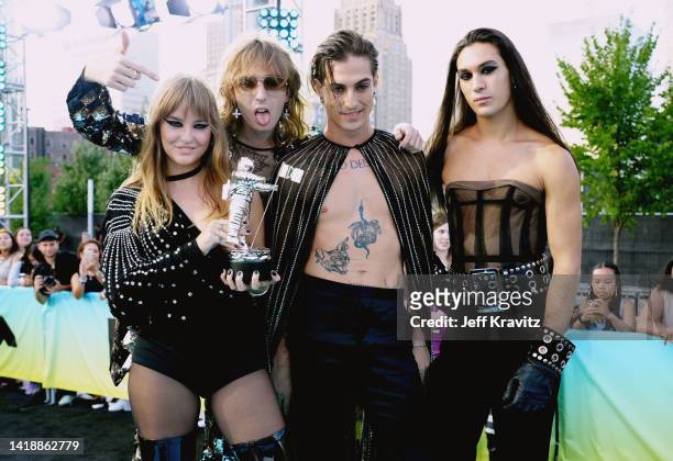 Victoria De Angelis, Thomas Raggi, Damiano David and Ethan Torchio of Måneskin attend the 2022 MTV VMAs at Prudential Center on August 28, 2022 in...