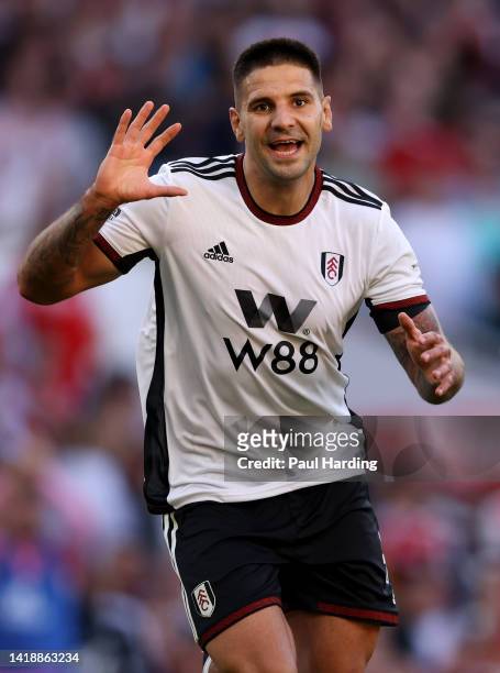 Aleksandar Mitrovic of Fulham celebrates after scoring their team's first goal during the Premier League match between Arsenal FC and Fulham FC at...