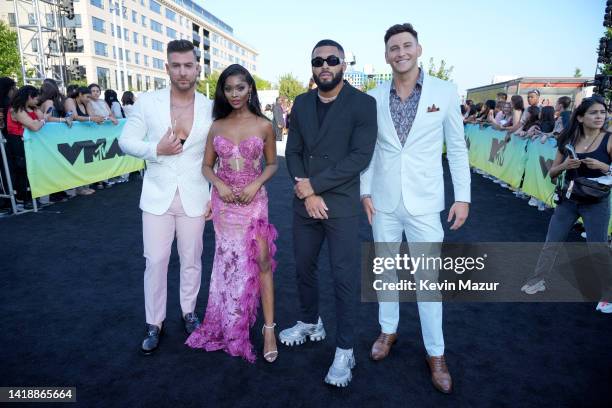 Mike Mulderrig, Trina Njoroge, Johnny Middlebrooks, and Blake Horstmann attend the 2022 MTV VMAs at Prudential Center on August 28, 2022 in Newark,...