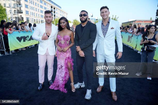 Mike Mulderrig, Trina Njoroge, Johnny Middlebrooks, and Blake Horstmann attend the 2022 MTV VMAs at Prudential Center on August 28, 2022 in Newark,...