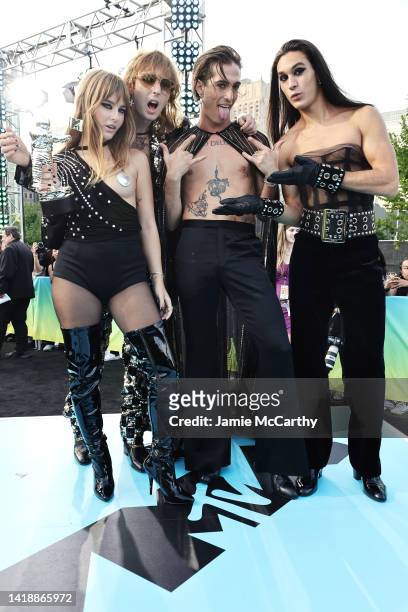 Ethan Torchio, Victoria De Angelis, Damiano David and Thomas Raggi of Måneskin attend the 2022 MTV VMAs at Prudential Center on August 28, 2022 in...