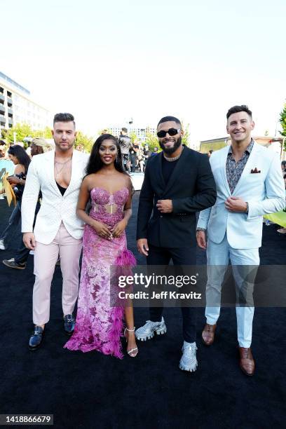 Mike Mulderrig, Trina Njoroge, Johnny Middlebrooks, and Blake Horstmann attend the 2022 MTV VMAs at Prudential Center on August 28, 2022 in Newark,...