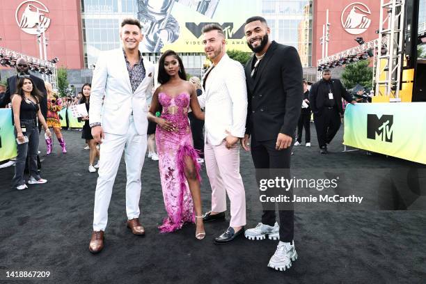 Blake Horstmann, Trina Njoroge, Mike Mulderrig and Johnny Middlebrooks attend the 2022 MTV VMAs at Prudential Center on August 28, 2022 in Newark,...